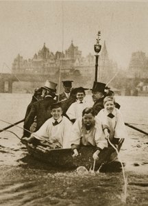 Choir boys of St. Clement Danes marking the boundaries of their parish, in a boat on the Thames by English Photographer